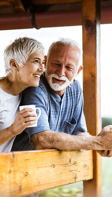 Stock lifestyle photograph of an older couple sharing coffee; not Kingdom Forge residents